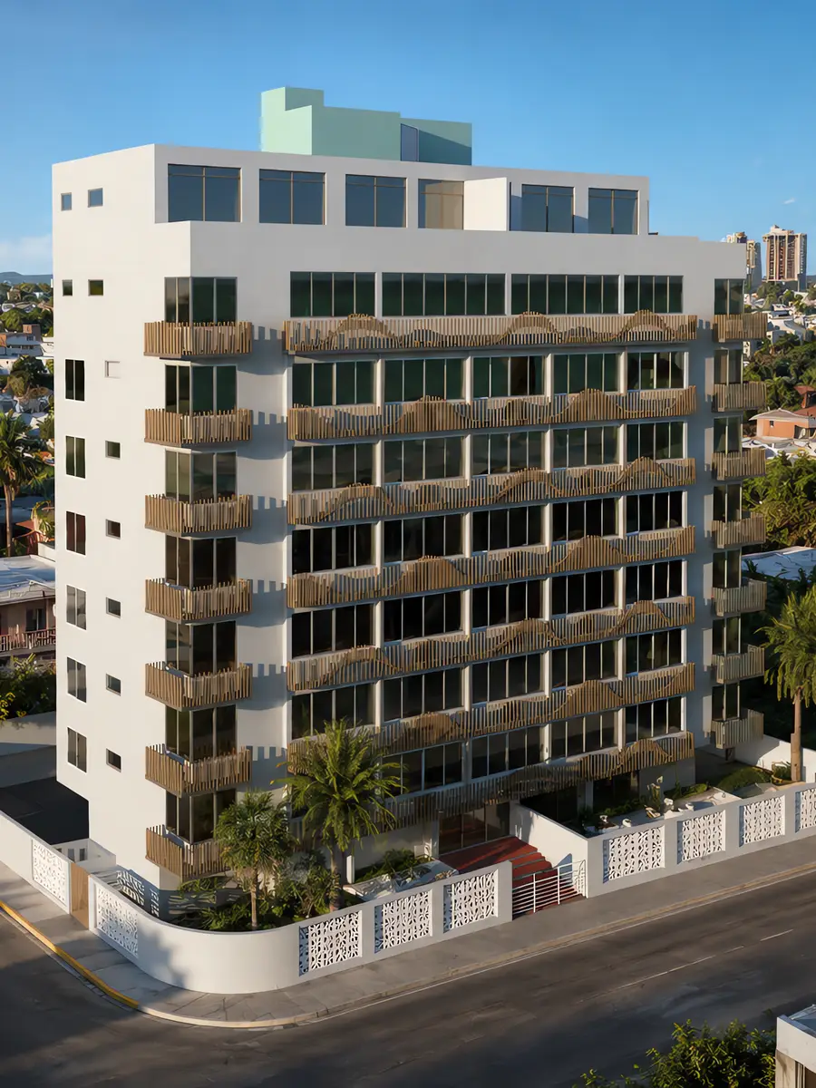 Ocean Park - elevated view of the renewed facade within its Ocean Park block, San Juan skyline beyond